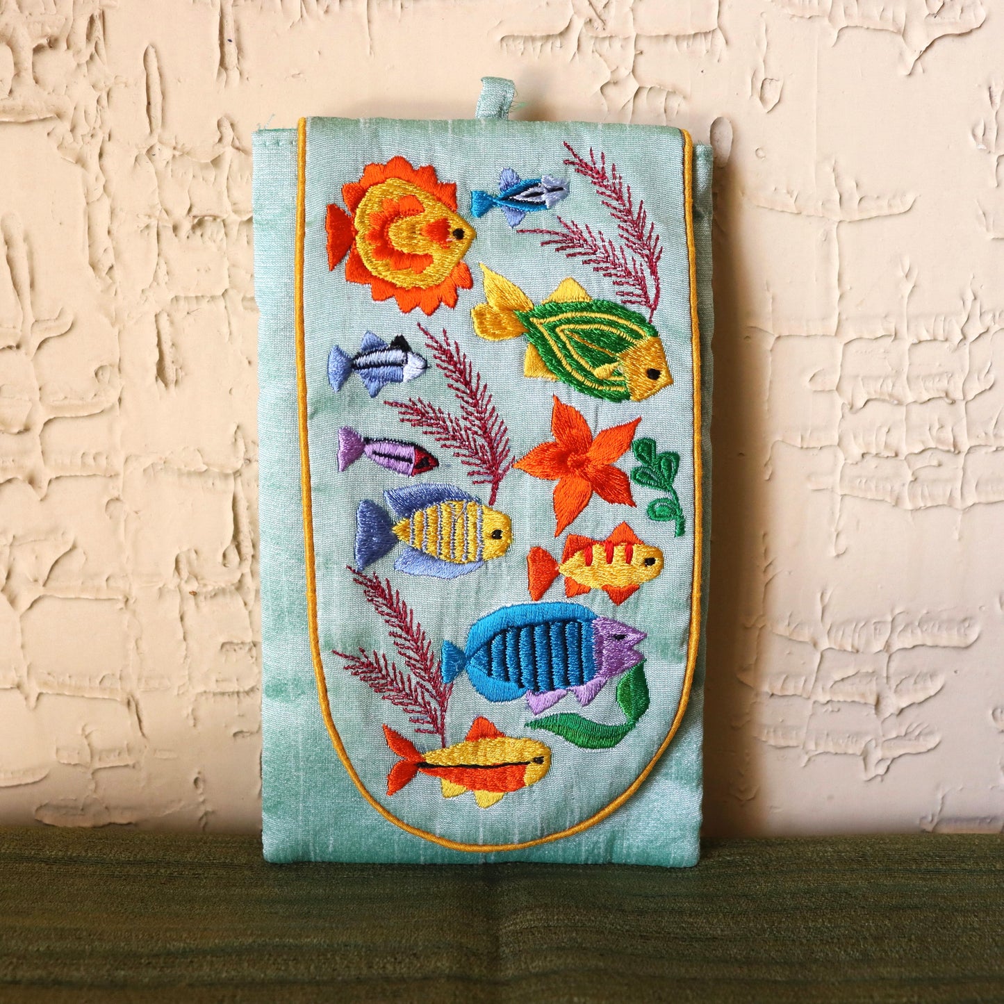 Embroidered silk fish sling