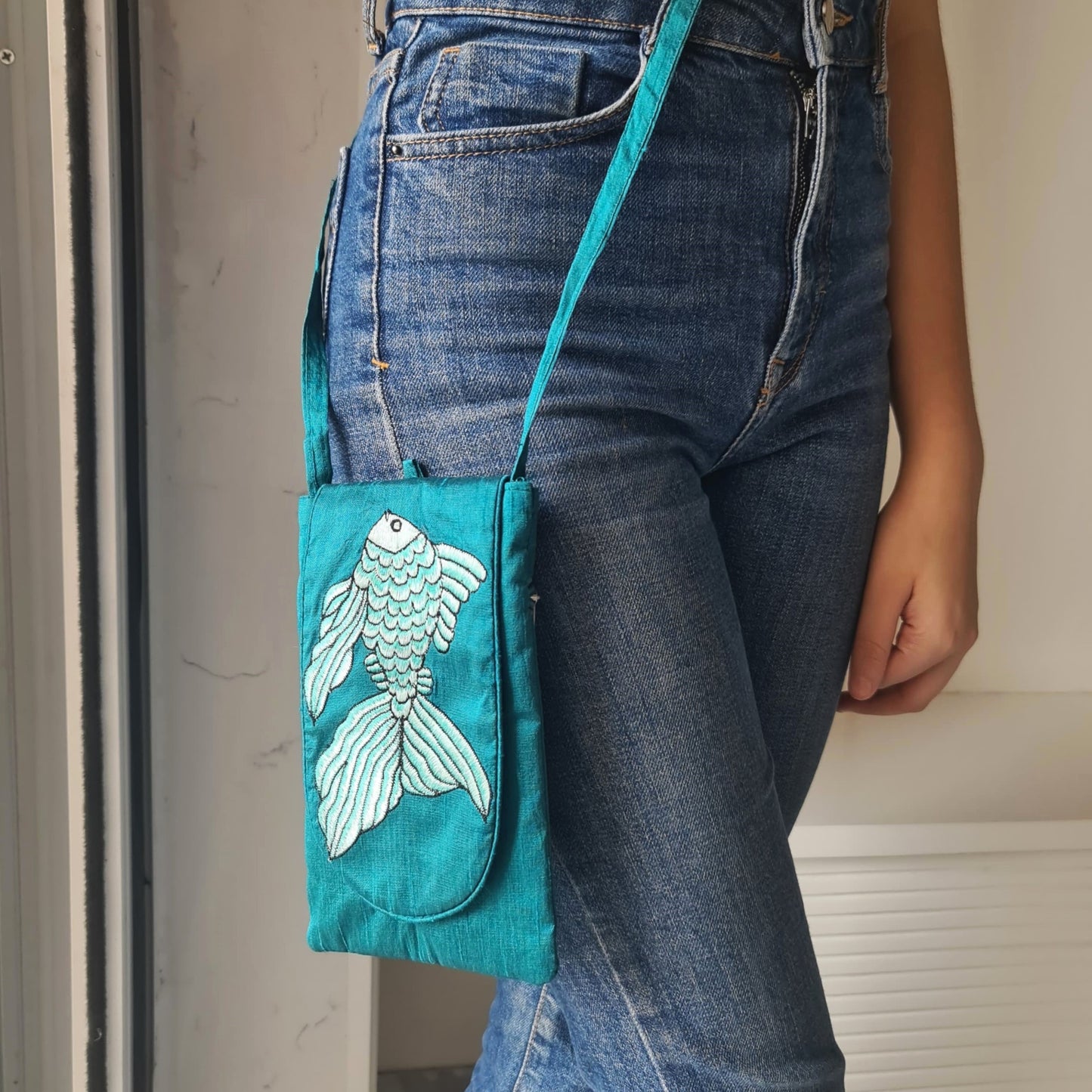 Embroidered silk fish sling