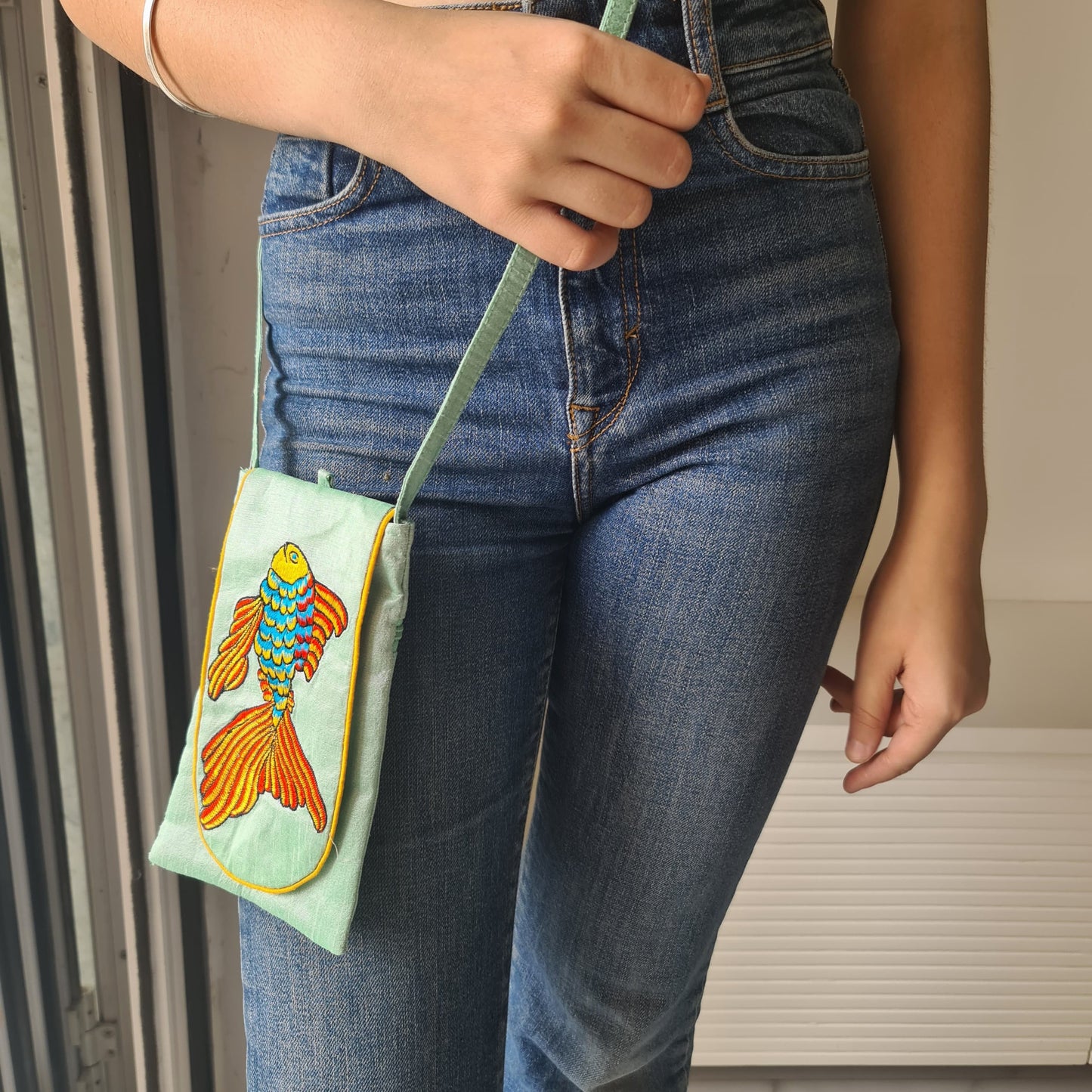 Embroidered silk fish sling